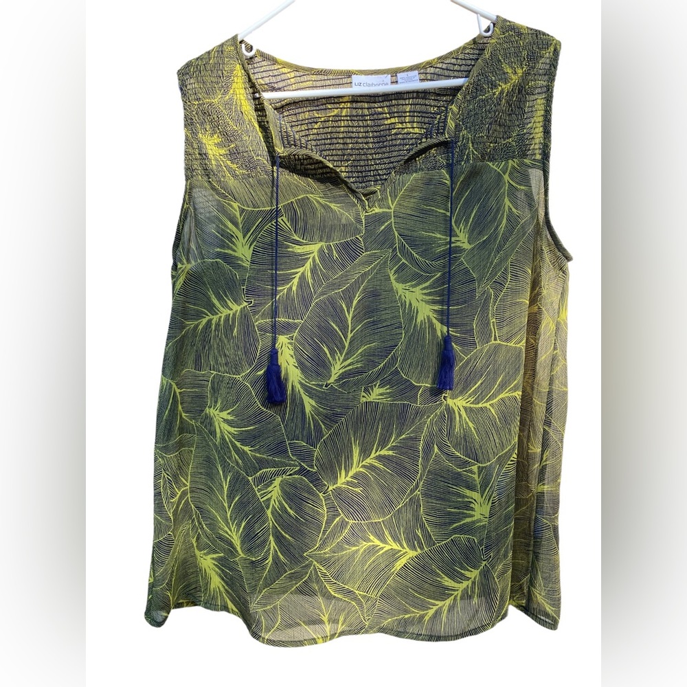 Beautiful green chiffon top with a blue shirt under .